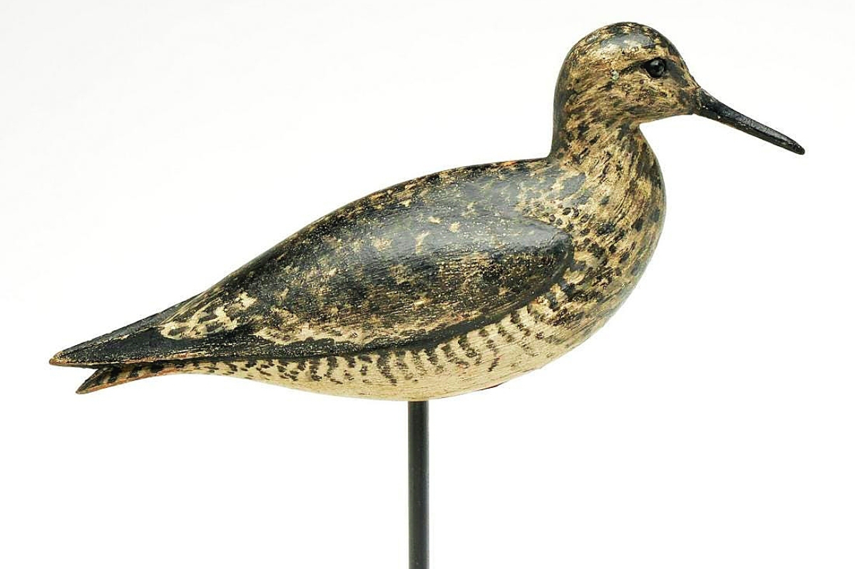 Of the five lots that sold for more than $100,000, two were shorebirds, one from Nantucket and this one from Long Island. It was a greater yellowlegs in a contented pose carved by William Bowman in the late Nineteenth Century. Well carved and well painted, it sold for $108,000.