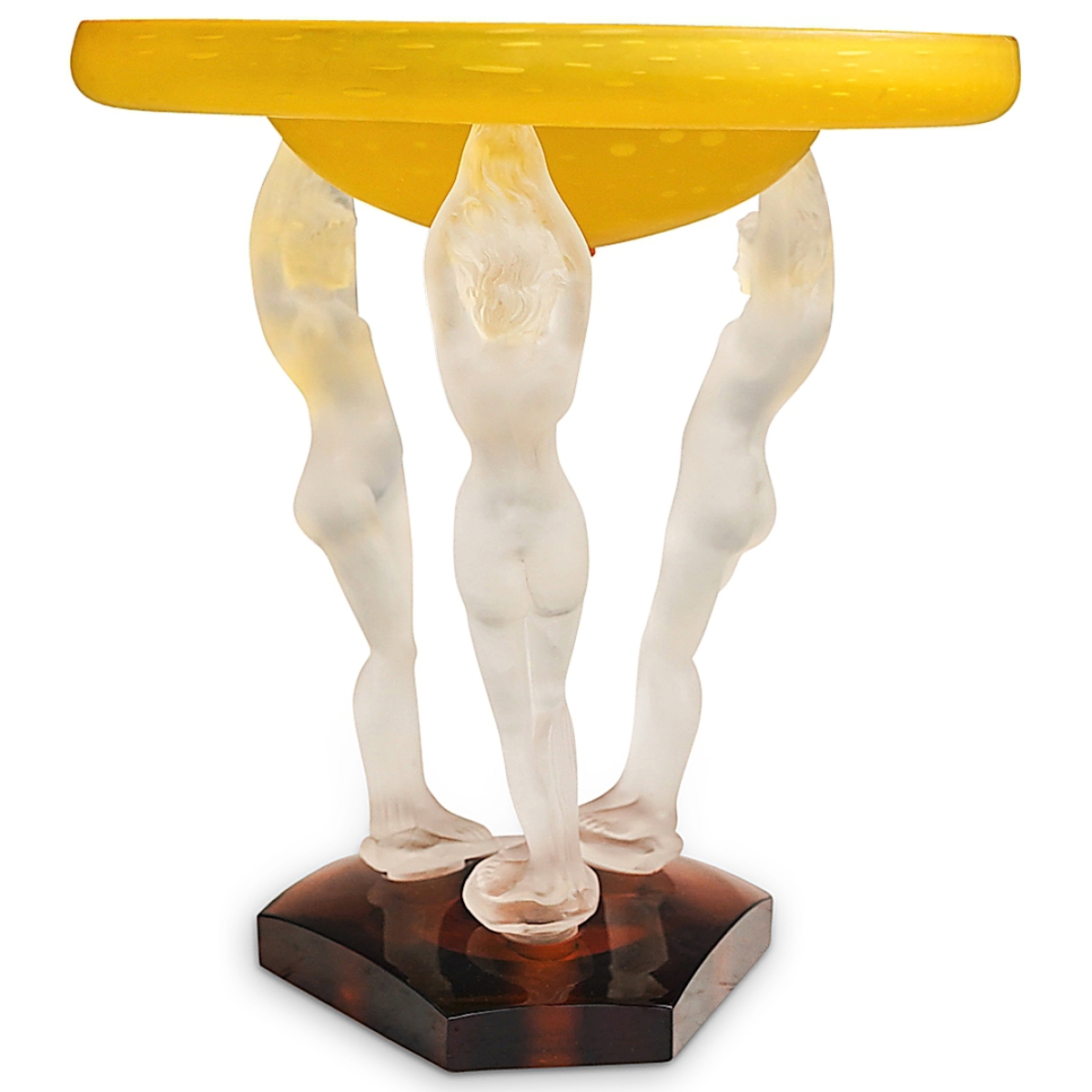 Perhaps one of only three known examples, a figural centerpiece bowl, Steuben’s “Diving Lady,” circa 1926, was bid to $16,250. Three frosted nude figures support a bright yellow bowl.