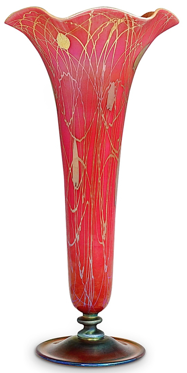 The top lot in the Alan and Susan Shovers collection of rare Steuben glass was this gold ruby footed floriform vase, circa 1910-15, that sold for $56,250 against a $1/5,000 estimate. Decorated with gold aurene leaf and random vine decorations, iridized lead glass with applied ornaments, the vase was marked “547 Aurene” and stood 12¼ inches high.