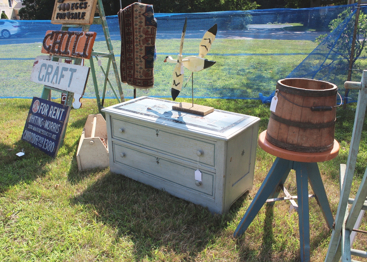 Painted furniture of all vintages is in plentiful supply at the show in Cape Cod. Jim Luskay, Doc Engine, Holliston and South Dennis, Mass., had this blue painted two-drawer low chest with paint decoration by Kathy Smith Harvey.