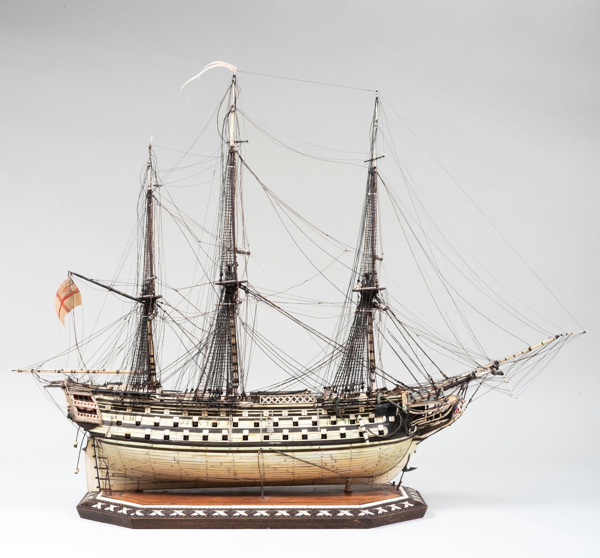 The identity of Daniel E. Matthews, who made and signed his name to this English three-masted bone Prisoner of War ship model, has been lost to history but that did not deter bidders, who pursued it with phone, internet and absentee bids. It was on a raised inlaid stand and despite restorations and some loose rigging, an American buyer bidding on the phone blew it to $28,290 ($5/10,000).
