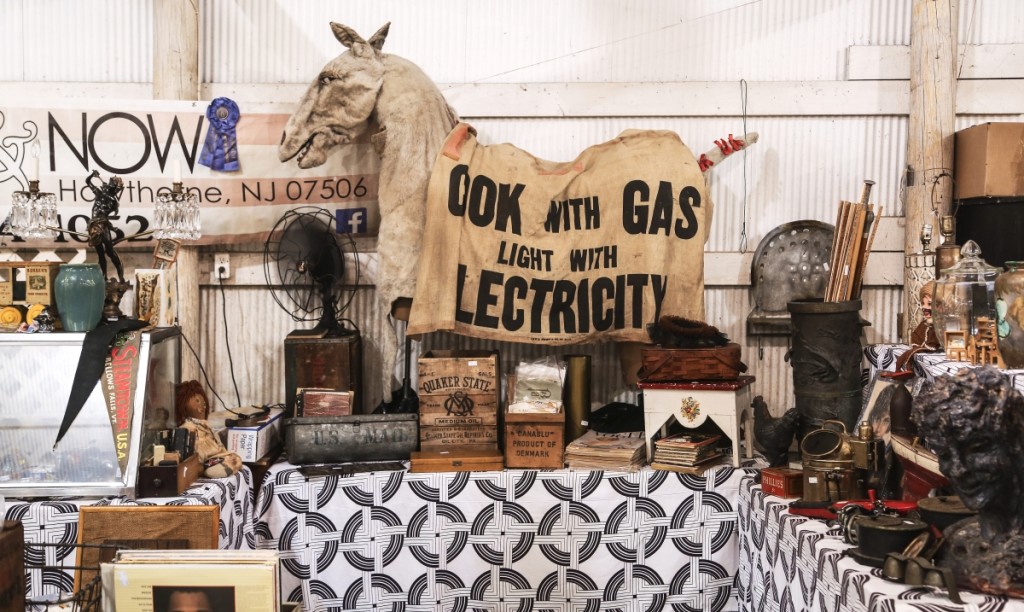 Then & Now Consignment Shop, Hawthorne, N.J., displayed a vaudeville donkey costume from the 1920s. Draped over it was an advertisement made for a horse that said “Cook With Gas, Light With Electricity,” promoting early electricity use.