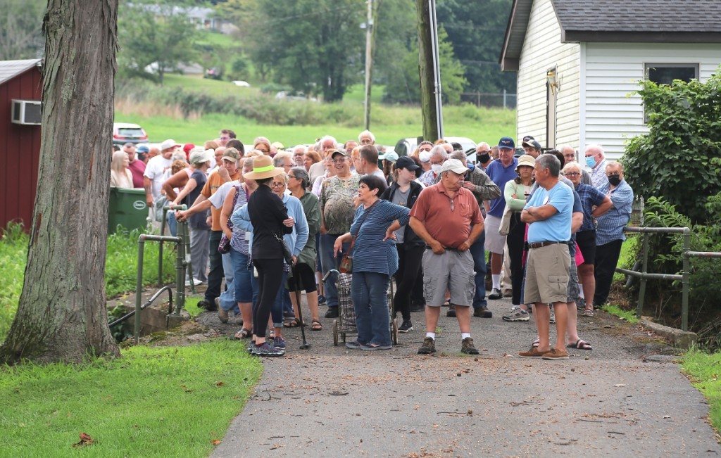 The gate just prior to the opening saw a horde of hungry buyers.