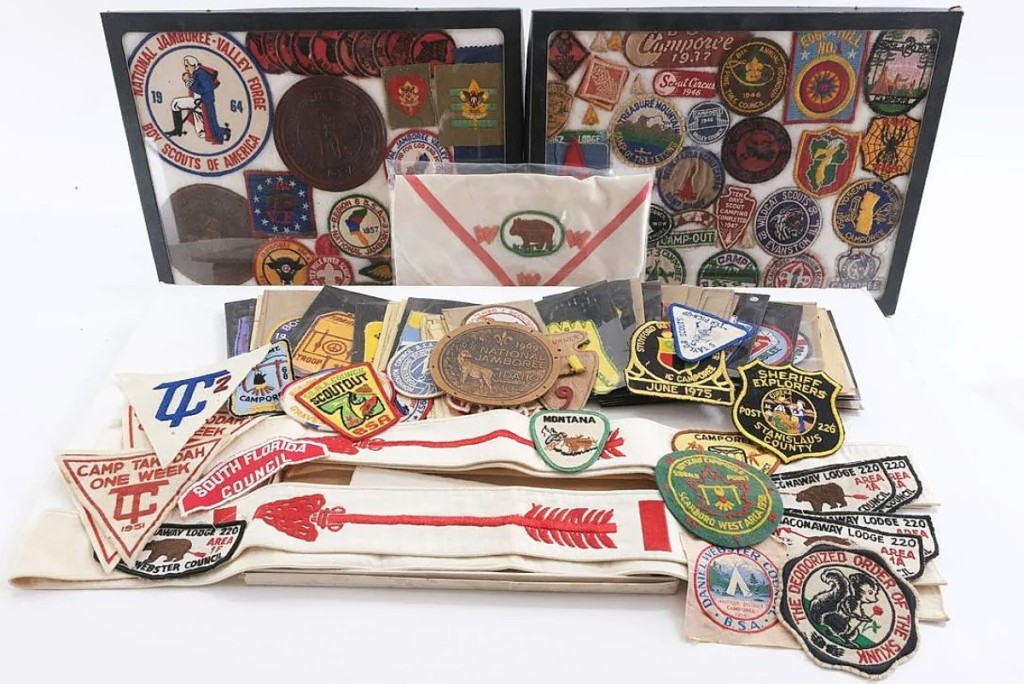 Selling for $1,169 was a large group of vintage patches and awards for the Boy Scouts of America and Girl Scouts of America ($100/200).