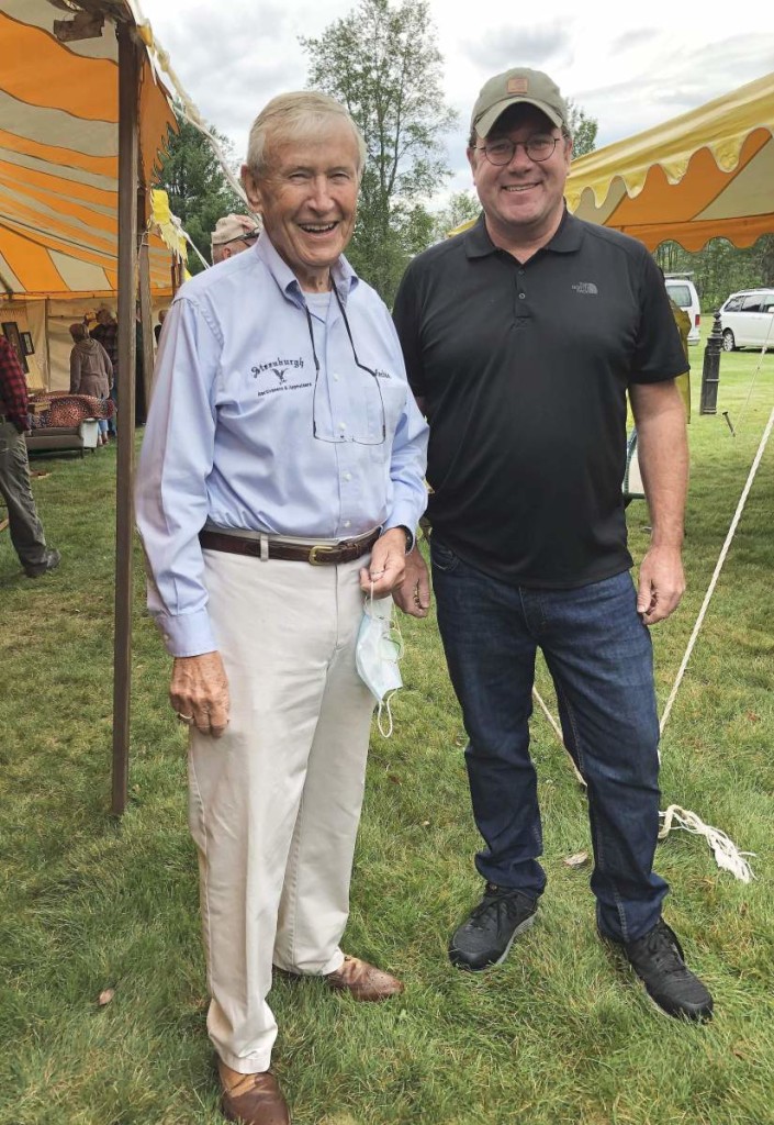 Archie Steenburgh, left, has been conducting auctions since 1972. Son Josh had been helping his father since the age of ten and got his auctioneer’s license in 1990. It’s still a family business.