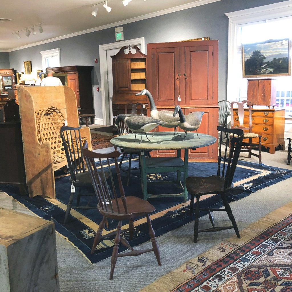 A portion of the American furniture included in the sale. The tall red cupboard sold for $5,900.