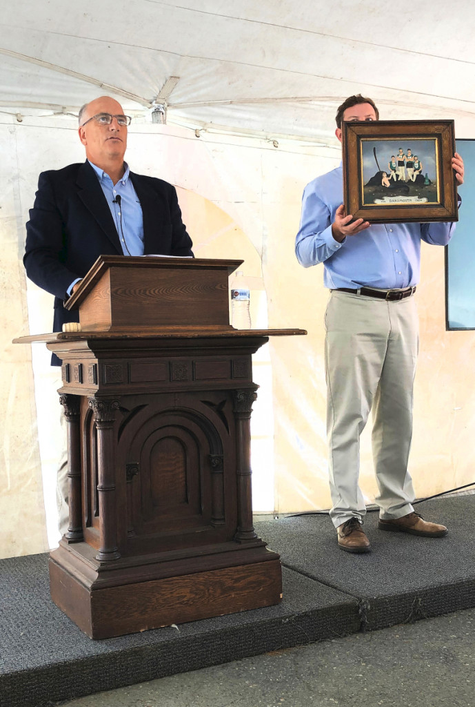Bill Smith selling the Ralph Cahoon painting of a Dartmouth College rowing crew.