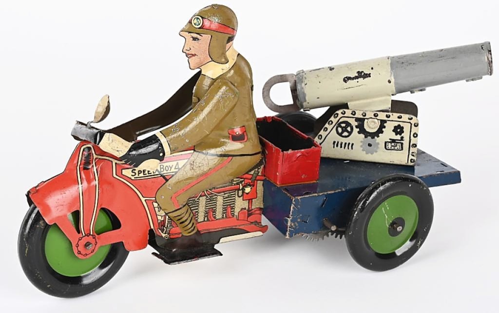 Tying for the sale’s top lot at $21,850 was this prototype Marx military motorcycle with mounted cannon. The auction house said the spring-loaded cannon was functional and could shoot a projectile. It measured 10½ inches long and featured hand painted details. The result is an auction record for any Marx toy.