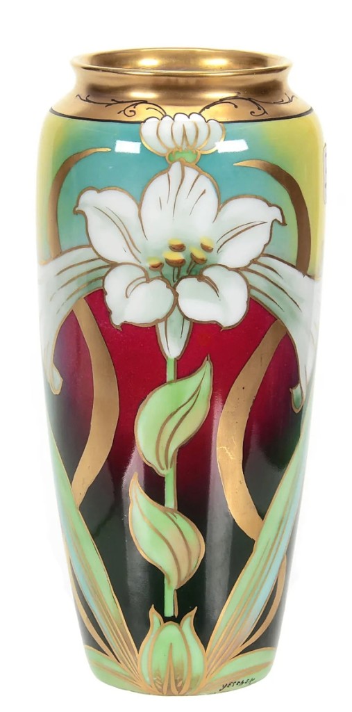 A bidder wore this design on her face mask to the sale. The Pickard Lily vase measured 7½ inches and sold for $5,500.