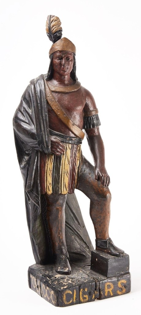 A rare early countertop cigar store Indian attributed to Thomas Brooks, New York, circa 1870, was bid to $20,000.