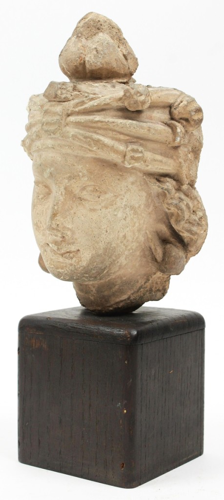 Dating to the Second or Third Century, this Gandhara stucco head of a bodhisattva realized $2,070. It was from the Love collection and had been sold by Christie’s in 2004.