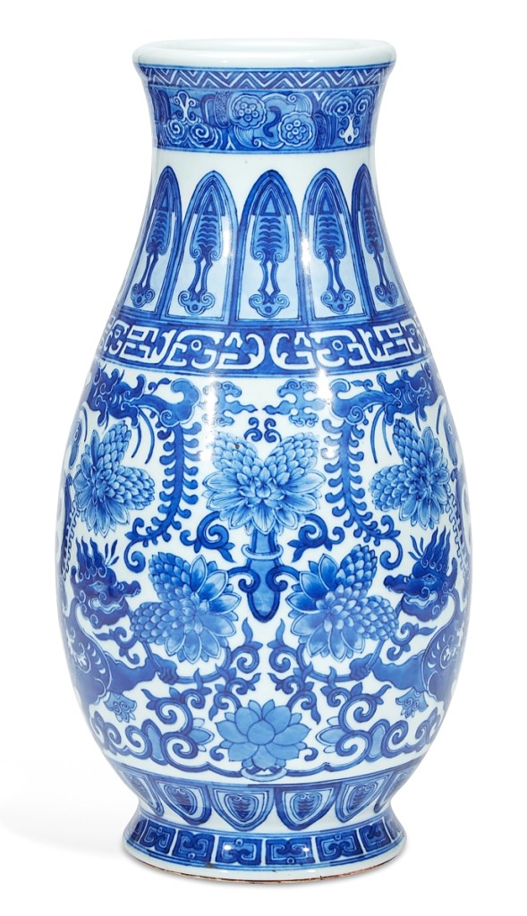 Fetching $32,750 ($10/15,000) was an unusual large Chinese blue and white porcelain archaistic vase.