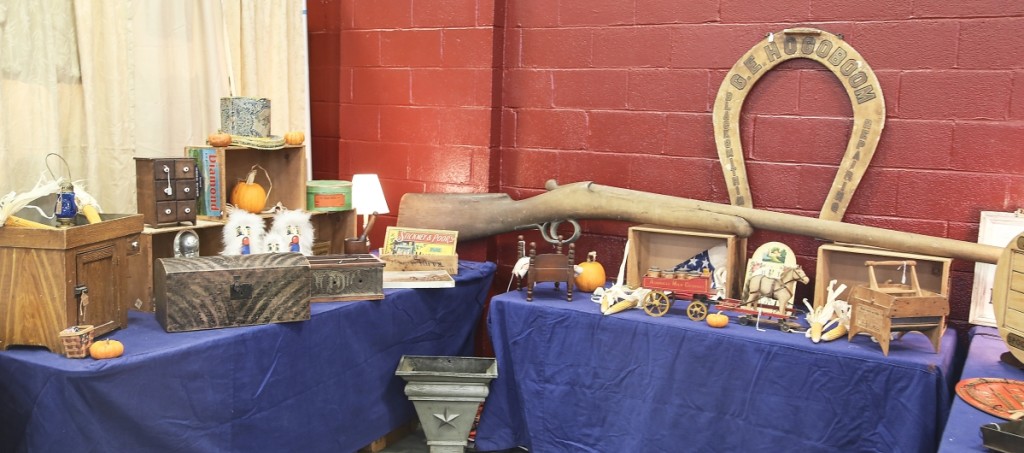 Prospect Hill Antiques of Essex Junction, Vt., brought a monumental carved wood trade sign in the form of a single barrel shotgun or rifle. —Black River Antique Show