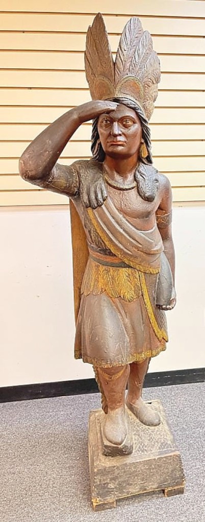 This 78-inch-tall cigar store Indian greeted patrons in Anthony’s Pier Four Restaurant in Boston. It stood next to the desk used by the maître-de. The surface seemed to be original, and the selling price, $18,000, was far above the estimate.
