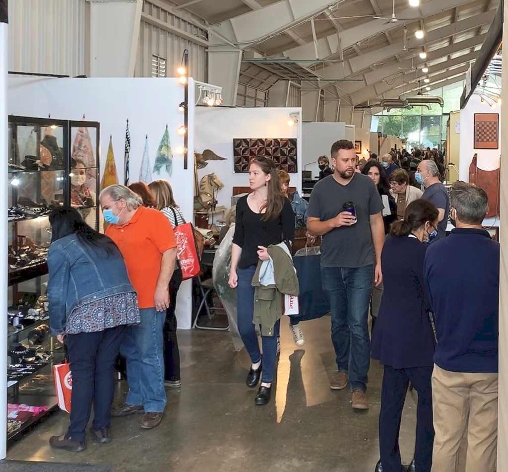 Crowds of shoppers quickly filled the aisles of each of the three buildings to hunt and gather as the show opened.   —Alex Gardner photo