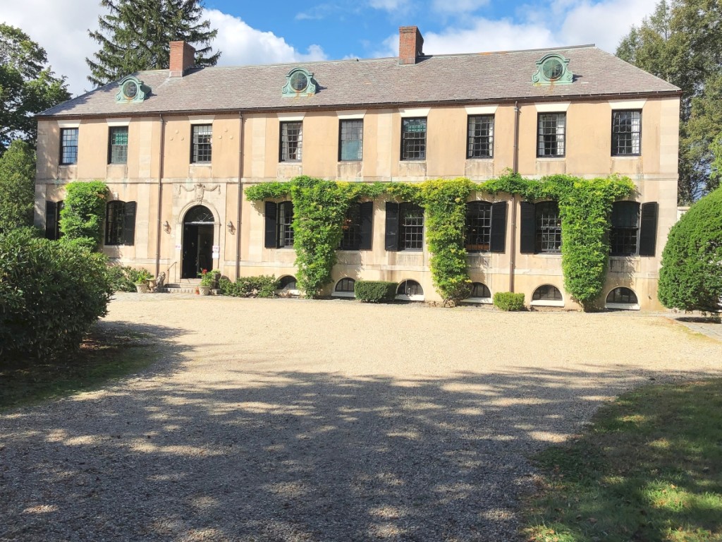 The entrance to the large, 11-bedroom home. The home and the 40-acre property are now under contract.