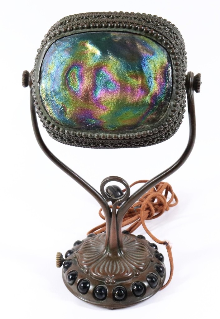 The sale was led by a Tiffany Studios turtleback glass table lamp that lit up to $17,220.