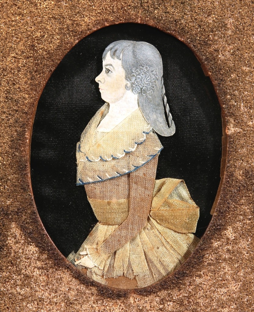 “Portrait of Polly (or Molly) Carew,” attributed to Mary Way or Betsey Way Champlain, circa 1787-88. Watercolor on paper, and silk, linen and sheer cotton pasted onto silk; 2-  by 2-  inches. Needlework authority Carol Huber speculates that the sisters studied with Polly Carew, for whom the Ways made what is thought to be their first known “dressed” miniature.