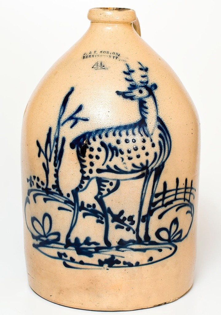 A record for a Norton pottery deer, this 4-gallon jug from the Bennington, Vt., potters, circa 1855, sold for $54,000.