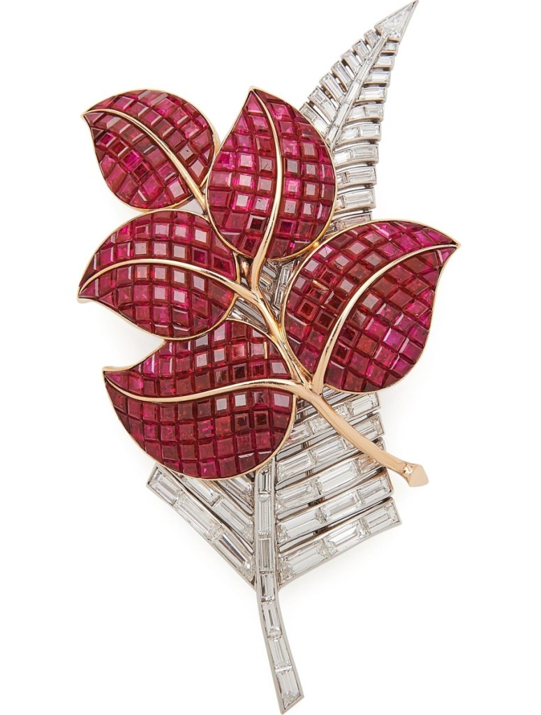 Bringing $781,250, unquestionably the star of the sale, was a fabulous circa 1935 “Mystery-Set” platinum, 18K gold, ruby and diamond leaf-form brooch. The “Mystery Set” technique, which hides signs of how it was constructed, was invented by Van Cleef & Arpels and, according to Taylor See, jewelry specialist, each piece required hundreds of hours of labor.