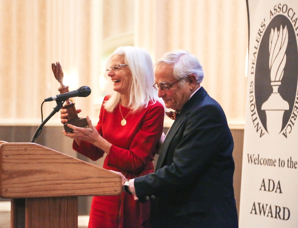 Karen accepts the flame finial ADA Award of Merit from vice president Arthur Liverant.