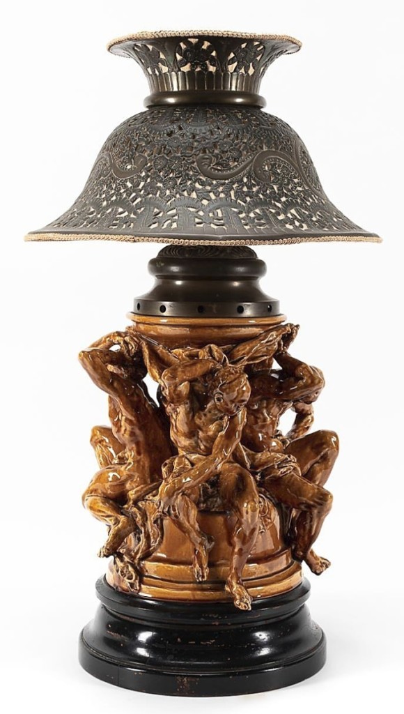 Adding to the fireworks on the third day was this large majolica figural table lamp, estimated just $500-$1,000 but pushed to $28,125. The piece was made by Hautin & Boulanger & Cie (French, 1804-1938) and incorporated a sculptural brown ground majolica two-light lamp with four male figures on the base holding up an urn. Accompanied by Arts and Crafts-style pierced metal shade with fabric lining, the lamp stood approximately 31½ inches high, including finial, and the shade had an 18-inch diameter.