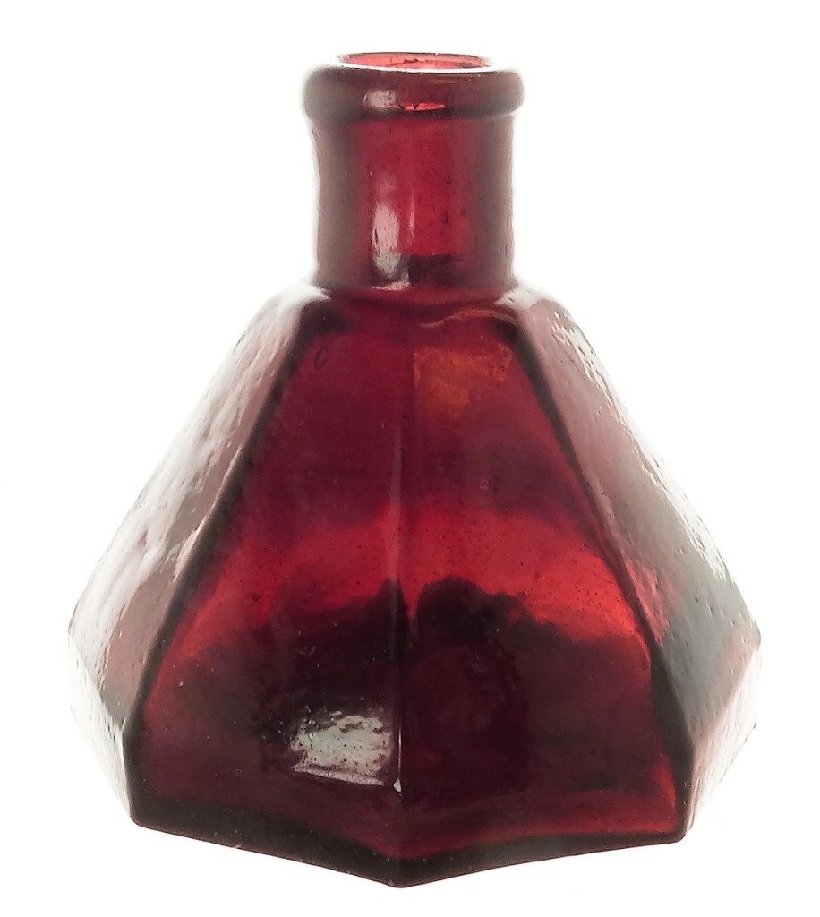 Another fine example from the Hammer collection, graded a 9.5, this Umbrella ink with rolled lip and open pontil, 2½ inches high, brought $3,450. “No umbrella ink collection could not be complete without a puce or grape color example,” stated the catalog.