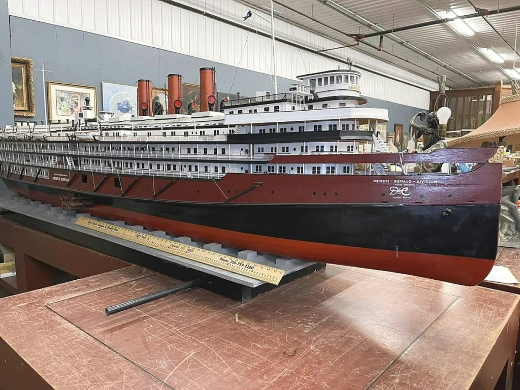 The SS Greater Buffalo was one of the two largest side-wheeled excursion steamers to ever sail on the Great Lakes. During World War II, the US Navy took control of the vessel, lopped off its upper cabins and used it as an aircraft carrier to train Navy pilots. The newly named USS Sable was then scrapped at the end of the war. This 11½-foot model pays homage to the size of the original and sold for $6,490.