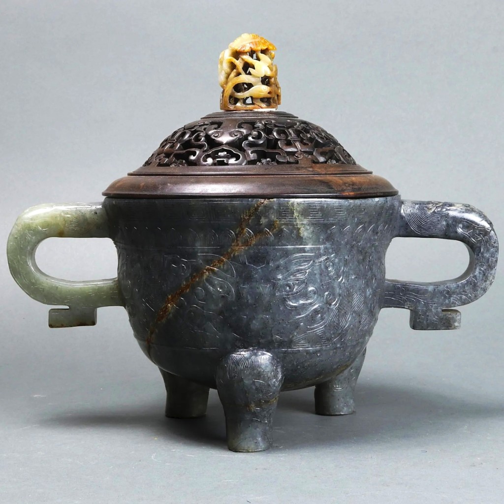 At the forefront of Asian arts was this Chinese jade tripod censer which sold for $ 13,750.