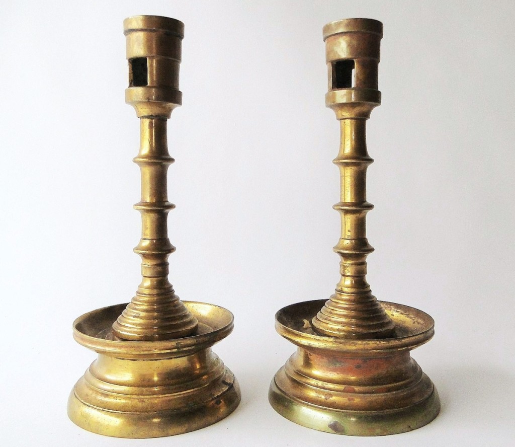Fetching $2,125 was this rare pair of Sixteenth Century brass candlesticks originating from Holland or the low countries.