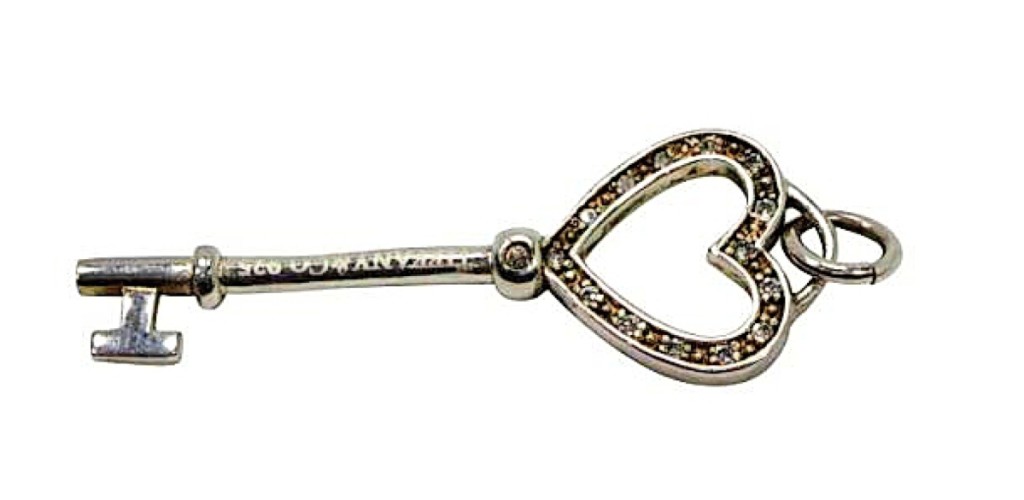A Tiffany & Co .925 sterling silver “key” pendant unlocked a winning bid of $343.