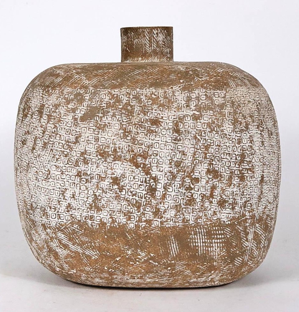 Topping pottery lots was this 13½-inch-tall ceramic vessel made and signed by Claude Conover that rolled out the door for $5,843 ($4/6,000).