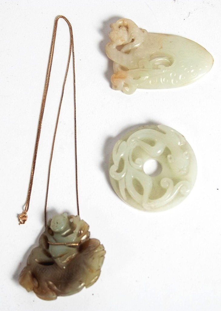 The rarity of white jade helped drive the result on this group of three Chinese jade pendants, two of which were white. A Chinese buyer prevailed over competition and bid the group to close at $11,160 ($150/300).