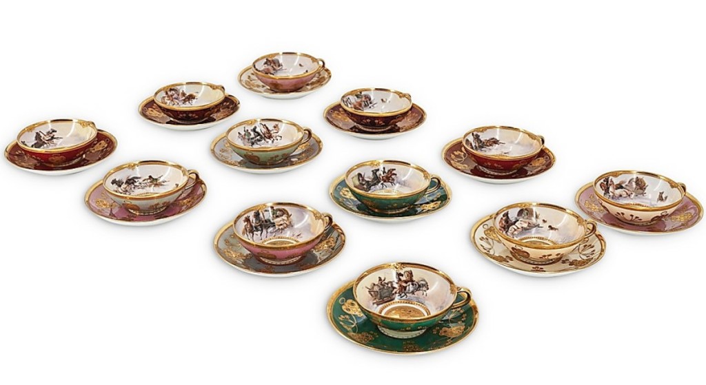 An important Dresden, Germany, Lamb porcelain tea set, circa 1900s, numbering 24 pieces and comprising 12 cups and 12 saucer plates that featured horse-drawn sled motifs with chasing hounds, against a snowy landscape, brought $27,500.