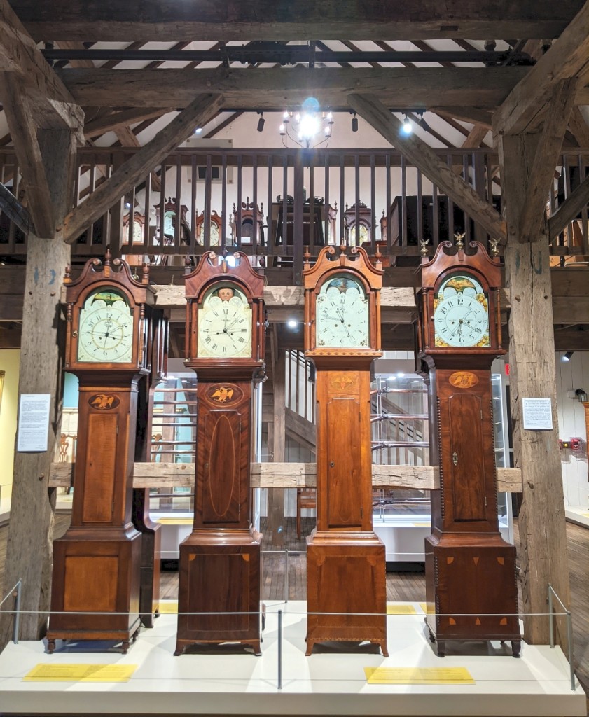 A tall clock exhibit at the John J. Snyder Jr Gallery of Early Lancaster County Decorative Arts at Historic Rock Ford.