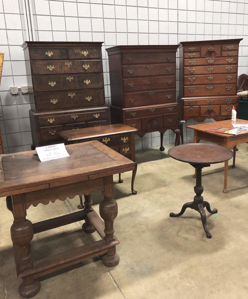 Jason Hietela, Lancaster, Mass., filled a large booth along the back wall with almost nothing but brown furniture and said the interest in this material is recovering. The Rhode Island tiger maple tall chest on the left was priced $8,000.