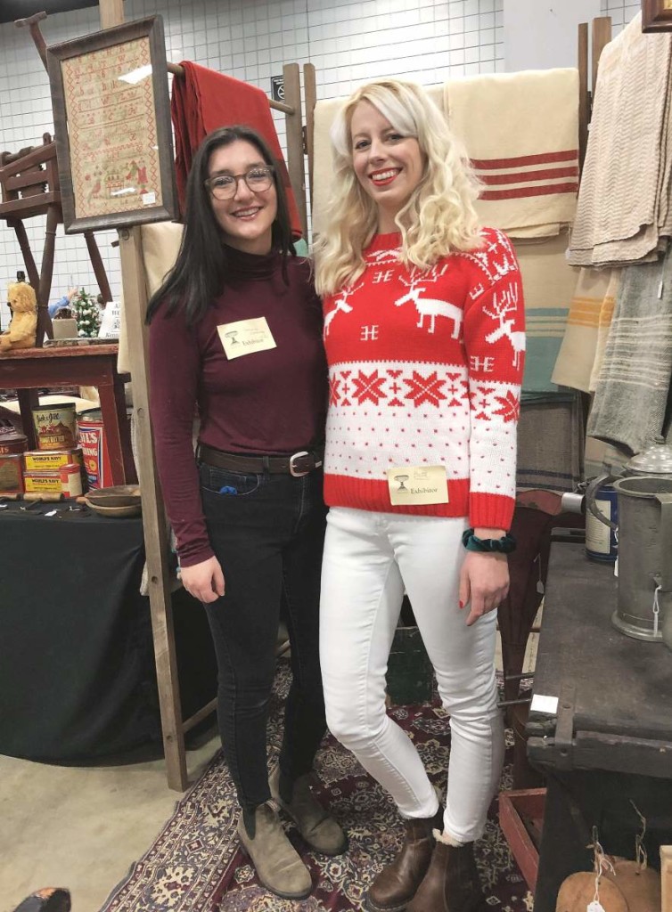 Allie Harris, left, and Beth Nowicki were setting up and manning the booth of Cindy Hamilton, Kennebunk, Maine. It was their first time at the show and they later said sales had been broad and good.