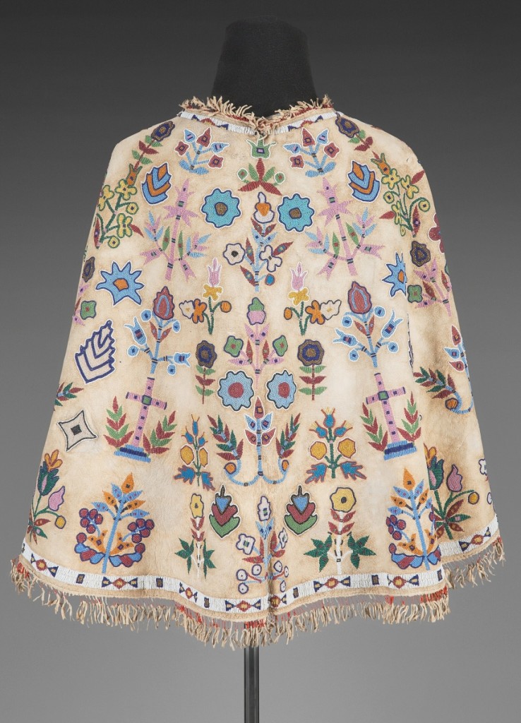 Small glass and brass beads, dyed porcupine quills, cotton and polyester cloth and sinew embellished this circa 1900 Sioux hide cape that was made by Julia Jordan, Oglala, for her daughter, Mary Julia. It brought $37,500 from an American museum and was the highest price in the sale.