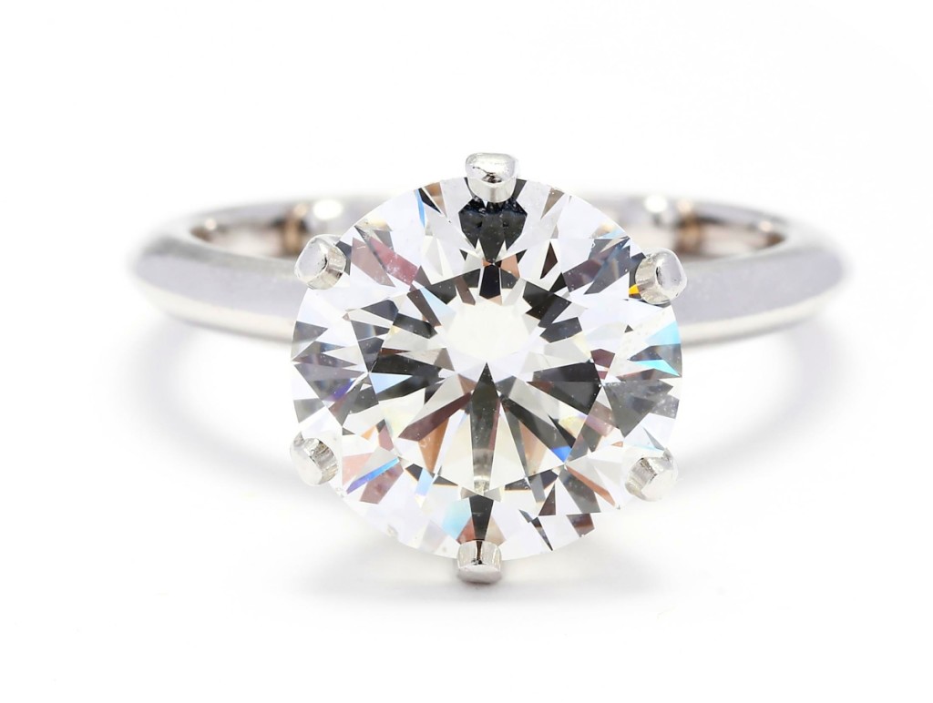 A platinum and 5.11-carat diamond solitaire ring by Tiffany & Co., size 5½, was bid to $106,800.