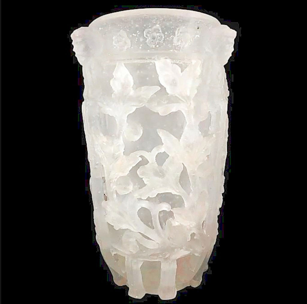 Leading the sale was this rare Steuben Diatreta vase. It surpassed its $25,000 high estimate to bring $46,875. Art Nouveau master glassmaker Frederick Carder created the piece in 1953 and used the term Diatreta to describe openwork objects made with the lost wax technique. The frosted glass vase featured elaborate floral details in high relief.