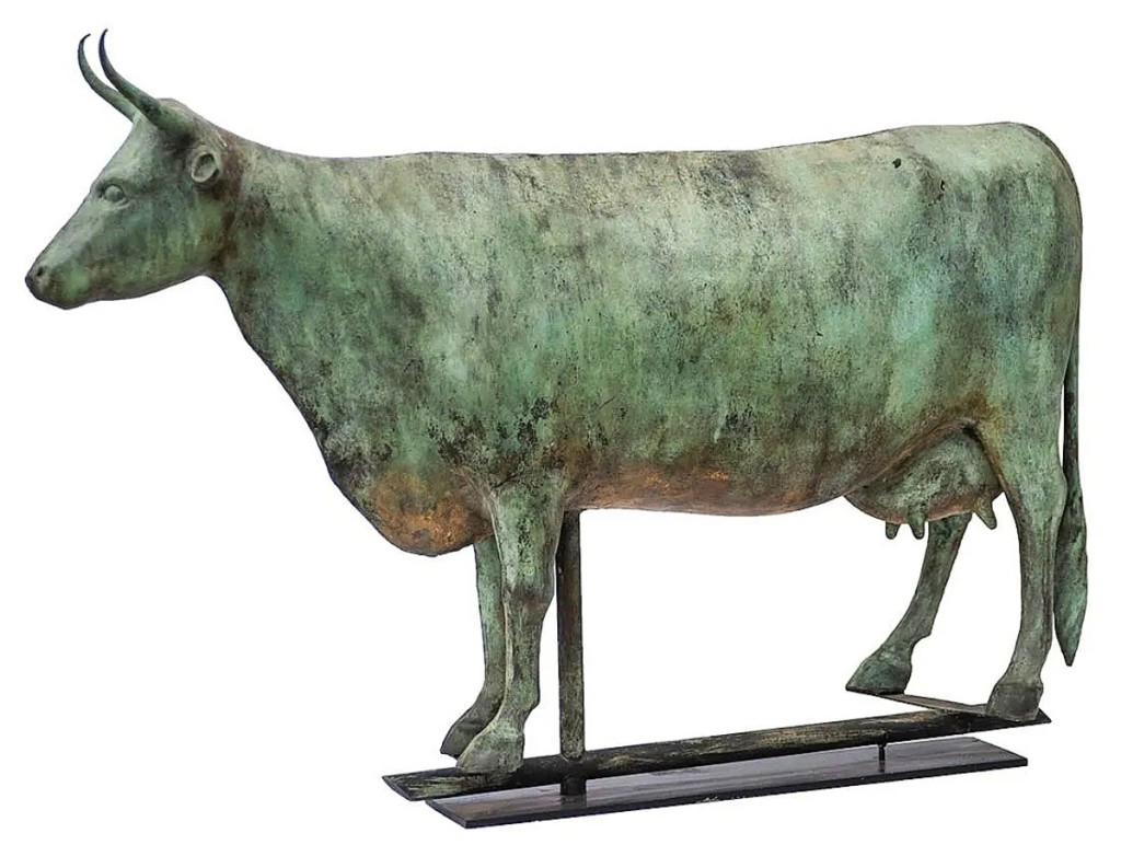 Tying for the sale’s top lot was this full-bodied cow weathervane in verdigris patina that sold for $8,125. It measured 32½ inches long and was “just a great representation of a cow,” according to Henry.