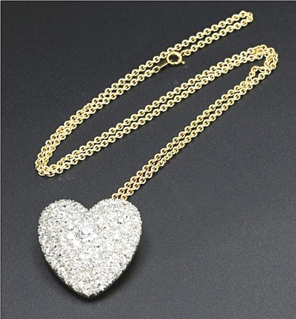 A Bailey Banks and Biddle diamond heart necklace surpassed its $3/6,000 estimate to sell for $11,000 to an online bidder.