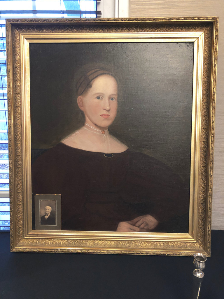 Mike and Lucinda Seward, Pittsfield, Vt., brought an unsigned Zedekiah Belknap portrait of a young woman and priced it at $875. Lucinda explained the details that showed the painting, although unsigned, to be the work of Belknap.