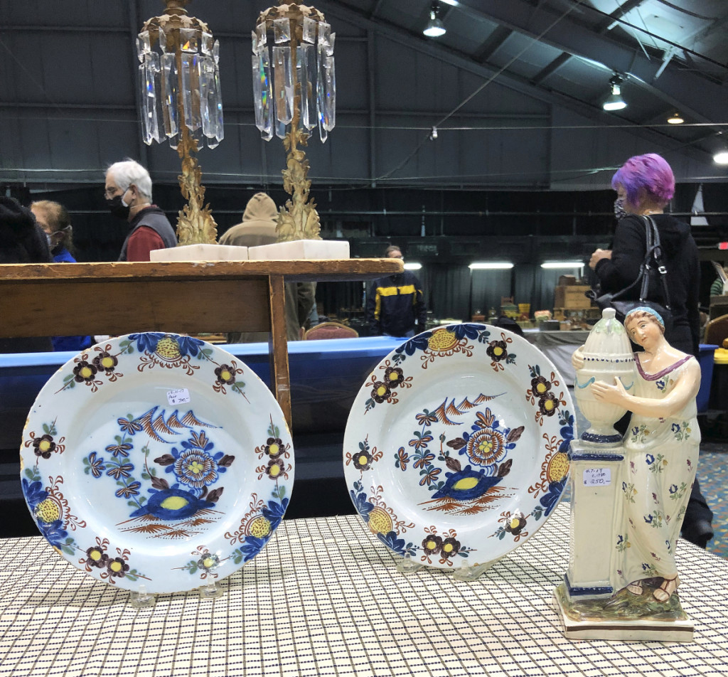 Linda DeCoste, Newbury, Mass., priced the pair of polychrome Dutch delft plates at $700. She dated them as circa 1780-1800. The Staffordshire figure was $250.
