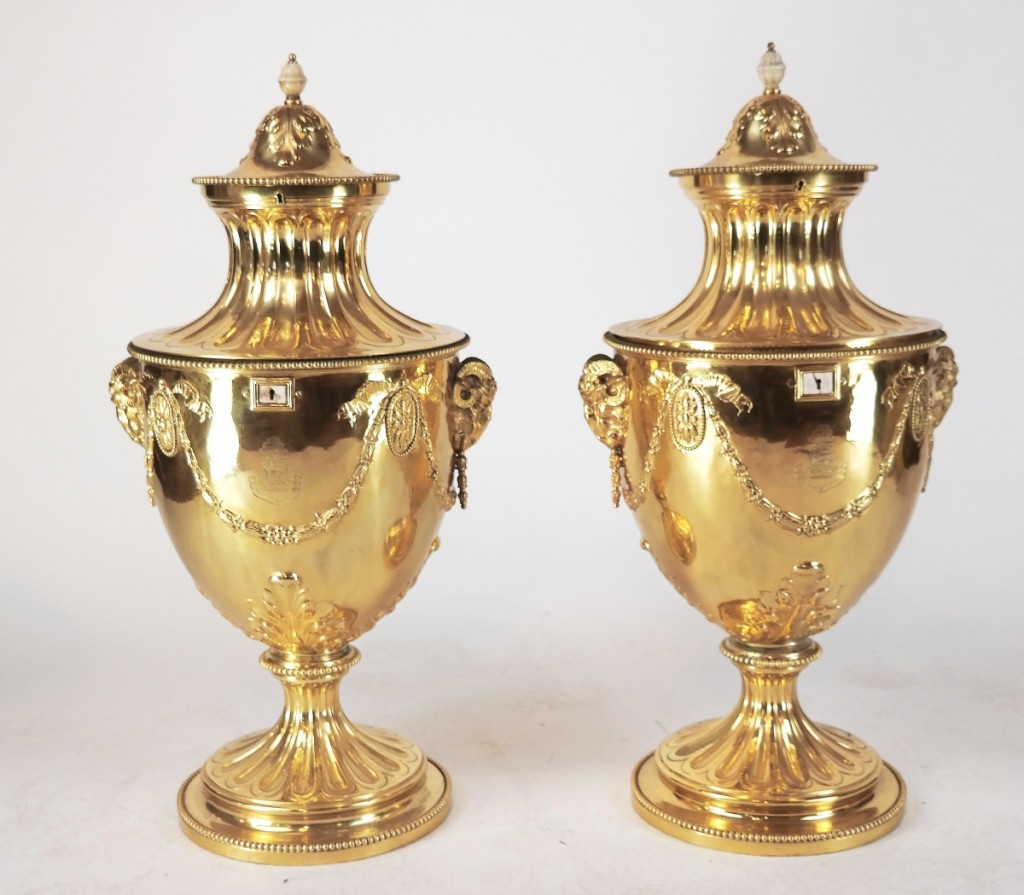 A sleeper was this pair of gilt bronze neoclassical-style urn-form wine coolers. Decorated with swags and garlands, gadrooning and ram’s heads, the lids fluted with bone finials, the 31-inch-high coolers quickly shot up to a selling price of $46,875 against their $2/3,000 estimate.