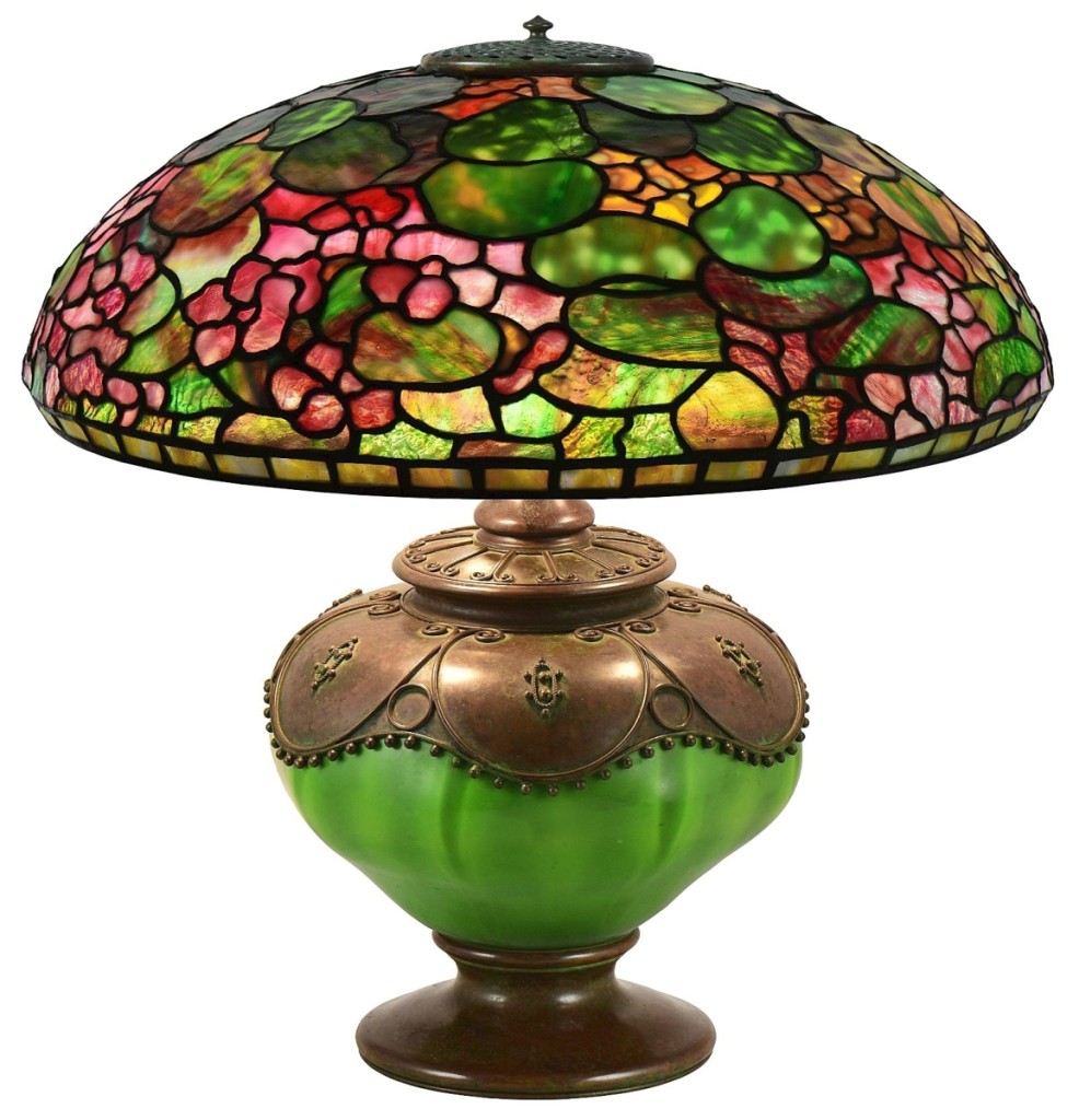 The star of the Tiffany table lamp offerings, bringing $109,375, was a circa 1905 Nasturtium example. It was signed twice on the shade, and the oil cannister base was also signed “Tiffany Studios, New York, 28644.”