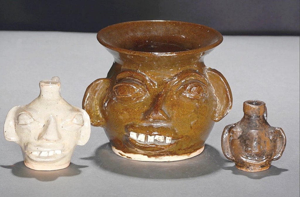 If bidders wanted smaller face jugs, those were available too. This three-piece group of a miniature spittoon and two miniature face jugs, the largest of which was the spittoon at 5 inches tall, were made by B.B. Craig. With all marked and in mint condition, the group of little vessels achieved a big result of $1,750 ($100/200).