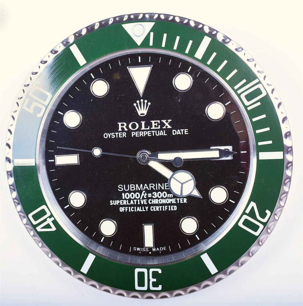 Of the three Rolex dealer showroom wall clocks on offer, this Hulk Submariner model reached the greatest depths, selling for $780 ($100/200).