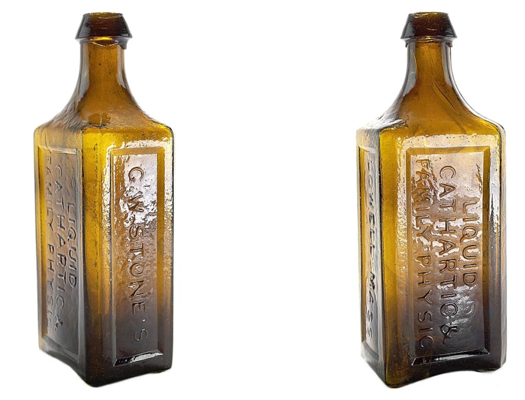 Easily the top lot in the sale, shown here in two views, was this deep yellowish “old” amber bottle labeled G.W. Stone’s — Liquid / Cathartic And / Family Physic — Lowell Mass,” circa 1840-55, which sold for $37,440. Standing 9 inches high, with improved pontil and applied tapered collar mouth, it was deemed a “perfect example” by the auction house.