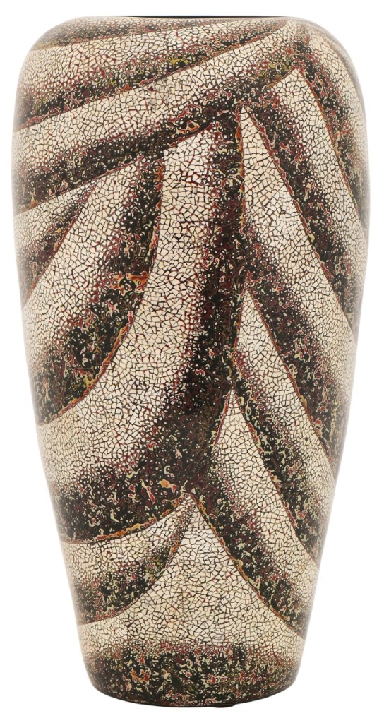 Jean Dunand worked in a variety of materials, including lacquer. Around 1925, he began to experiment with adding minute pieces of eggshell into his designs, a Japanese technique known as coquille d’oeuf. The process was virtually unknown in this country, but Dunand’s Art Deco designs rapidly became popular, and this vase earned $15,625.